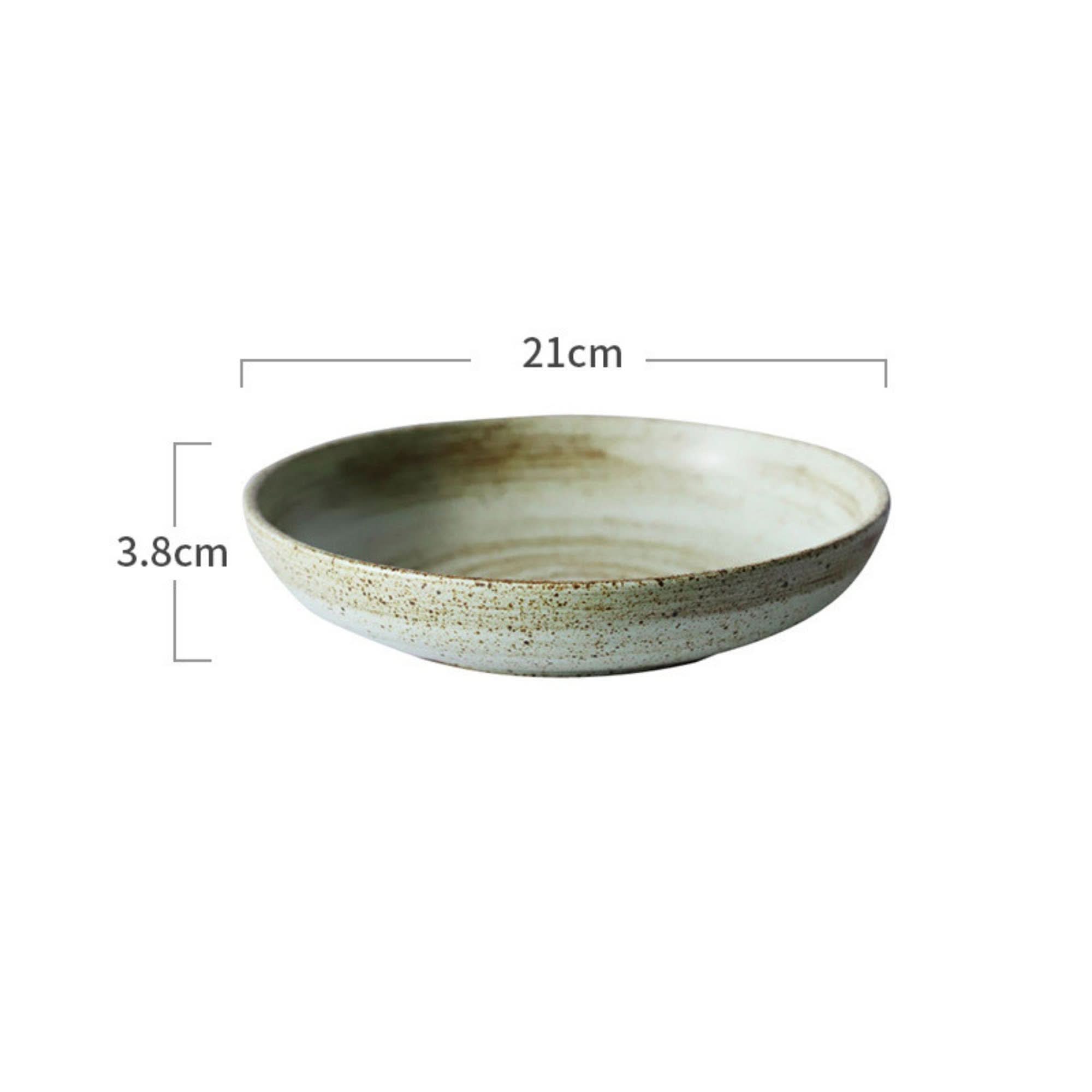 Rustic dinnerware bowl with white and brown spiral glaze, 21cm diameter.